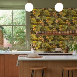 Arley Garden Dusk Wallpaper featuring a golden meadow with lush greenery and warm-toned wildflowers