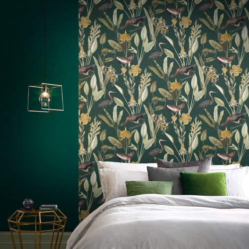 Elegant green wallpaper featuring intricate botanical and bird designs from Graham & Brown's Glasshouse collection