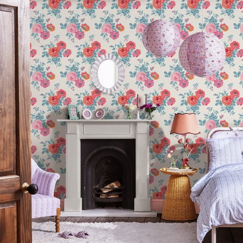 Room decorated with Archive Rose Blue & Pink wallpaper, featuring classic roses and vibrant teal foliage against a cream backdrop