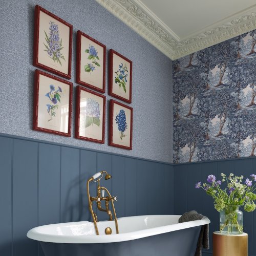 Graham & Brown wallpaper with a subtle fabric-inspired texture in rich blue.