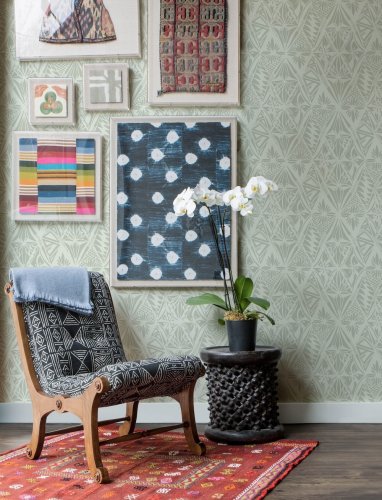 Stylish sage green wallpaper with modern geometric detailing and subtle botanical influences