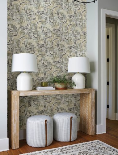 Contemporary green wallpaper with an organic, textured pattern