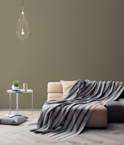 AS Creation Linen Texture Moss Wallpaper styled in a cosy living room