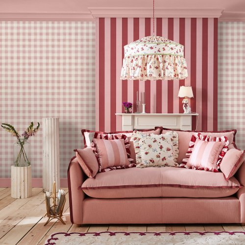 Room decorated with Painted Gingham Pink wallpaper, showcasing a cute pink and white gingham pattern