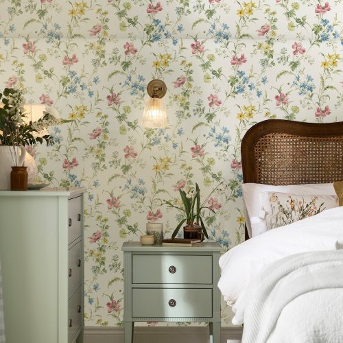 Floral Poppy Meadow wallpaper in multi colours by Laura Ashley.