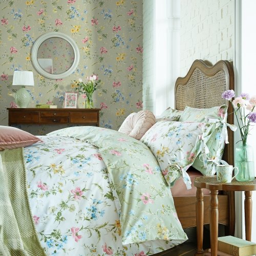 Country garden-inspired wallpaper with delicate poppy designs.