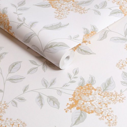 Elegant floral clusters on Laura Ashley Portland Apricot wallpaper.