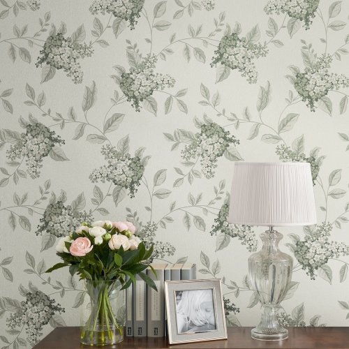 Portland Fern Wallpaper by Laura Ashley with natural floral and leafy patterns.