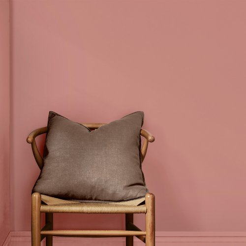 Interior wall painted in Poached Rhubarb for a vibrant, cheerful look