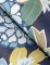 Vintage botanical wallpaper in deep indigo, blue, and gold tones