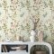 Wildwood Sage wallpaper styled in a cosy living room.