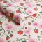 Roll of Strawberry Spring wallpaper featuring classic Cath Kidston floral and strawberry design