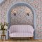 Room decorated with Strawberry Summer wallpaper showcasing a cosy country cottage feel